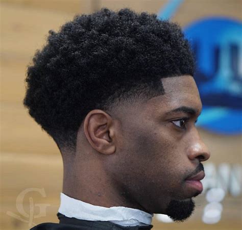 afro taper men|taper blowout haircut black men.